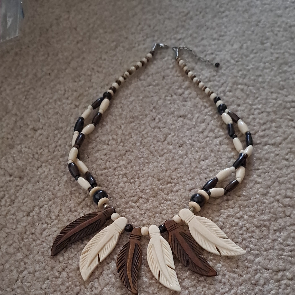 Beaded Necklace With Carved Feathers